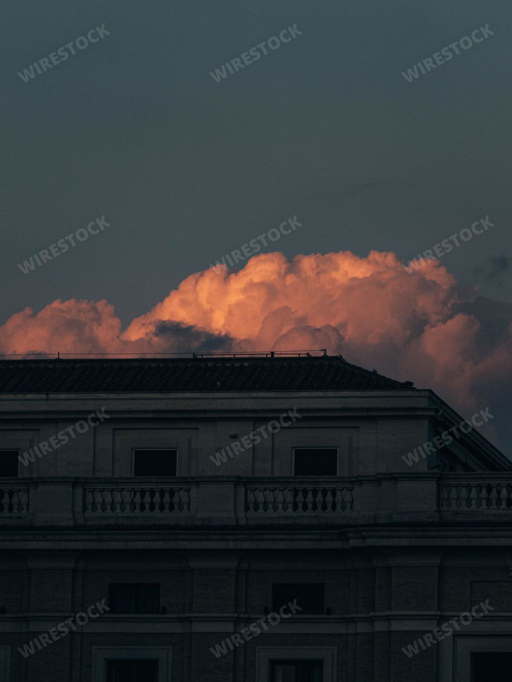 A vertical shot of the Vatican City at sunset. Italy