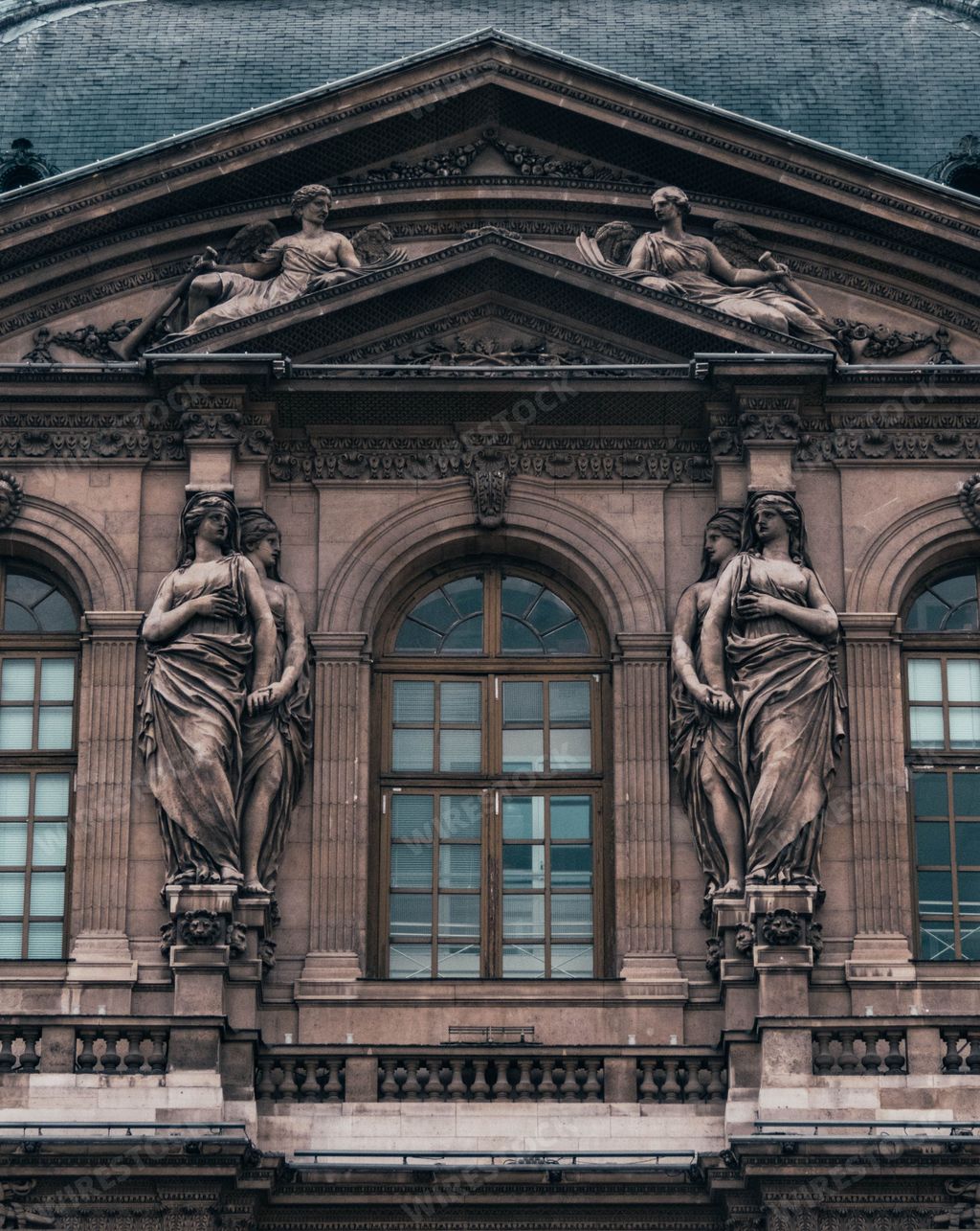 Louvre Museum in Paris, France facades, mirrors and corners