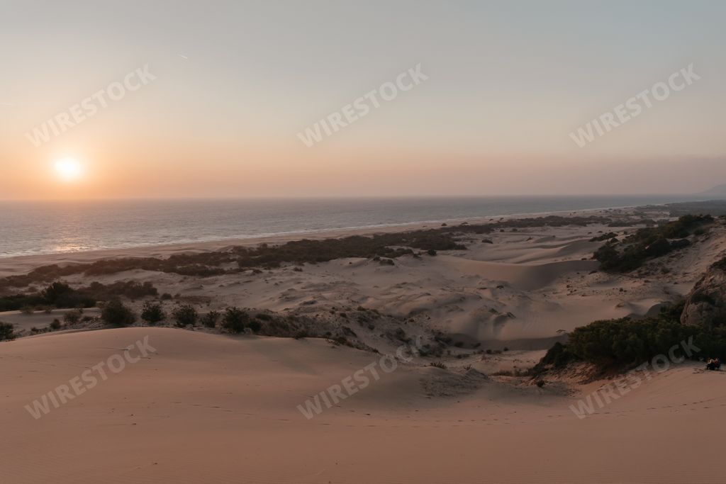 Scenic panorama with golden sand dunes under sunset sky. Travel destinations in Turkey, Patara Sand Dunes