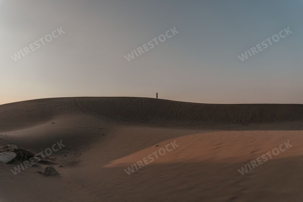 Scenic panorama with golden sand dunes under sunset sky. Travel destinations in Turkey, Patara Sand Dunes