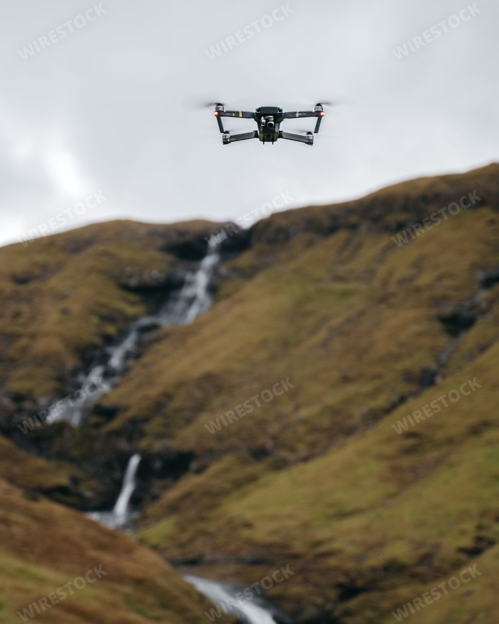 Image of DJI Mavic Pro quadcopter hovering in the air. The DJI Mavic Pro is a portable and powerful drone with a 3-axis gimbal 4K camera