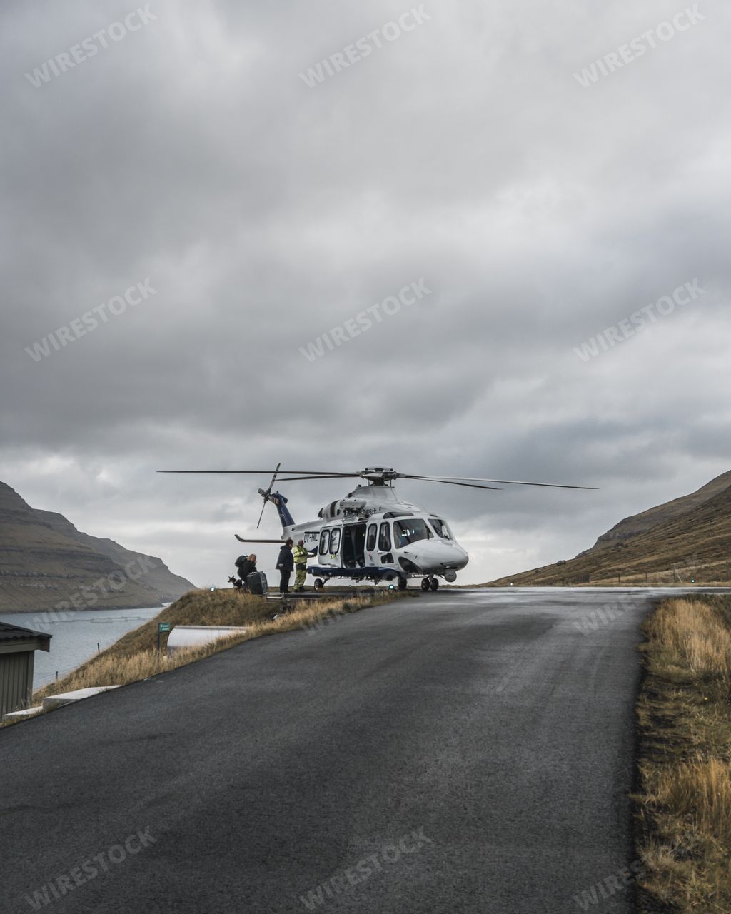 Atlantic Airways helicopter takes off on the remote city of Klaksvik