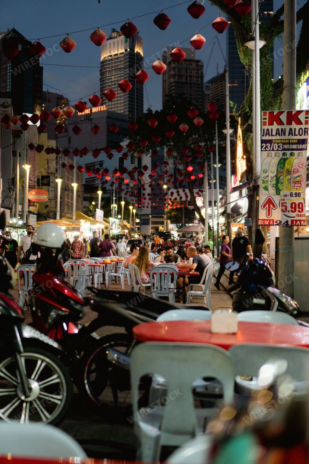 A vertical shot of the Jalan Alor food street in Kuala Lumpur, Malaysia