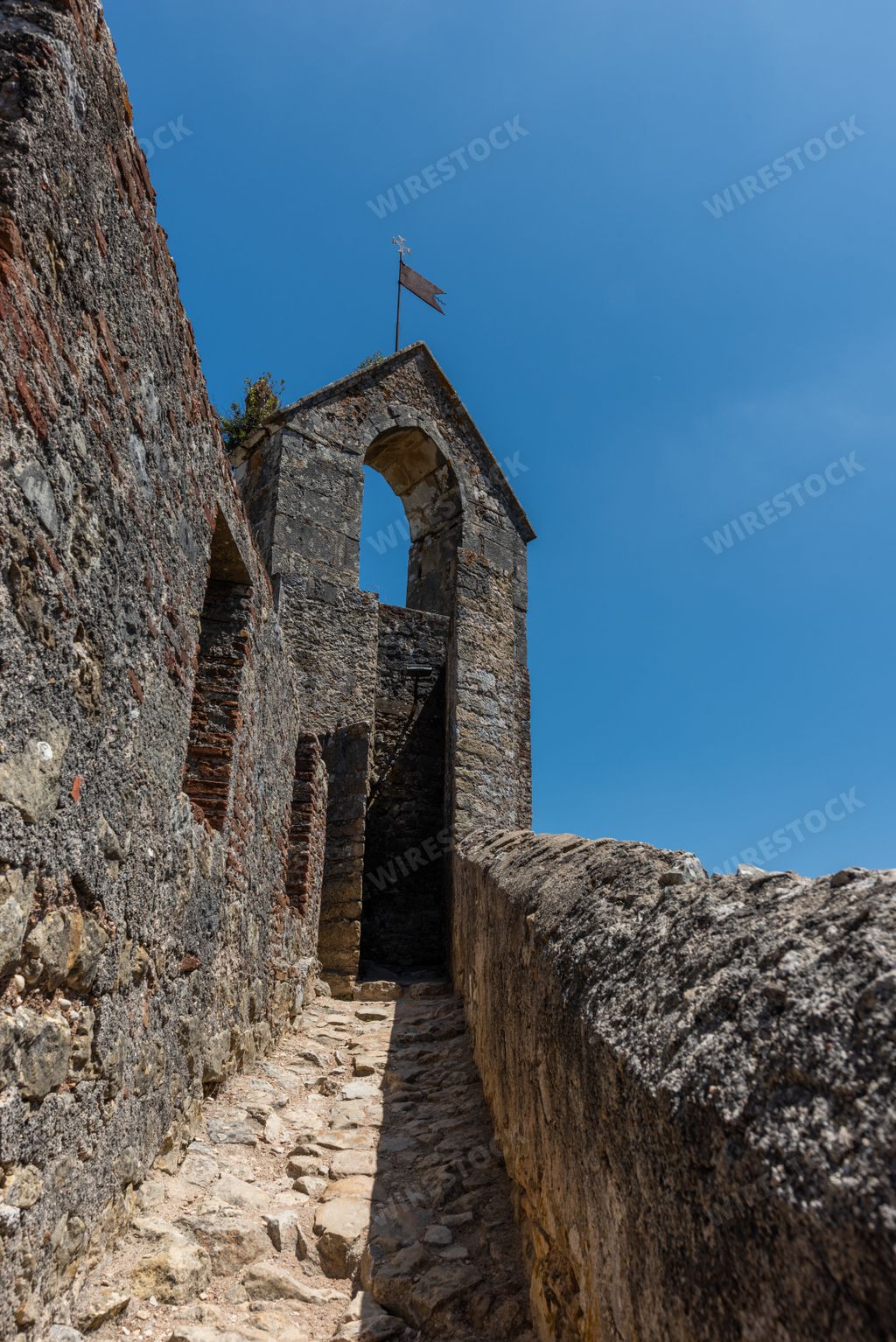 The Templar castle under sunlight and a blue sky in Tomar in Portugal