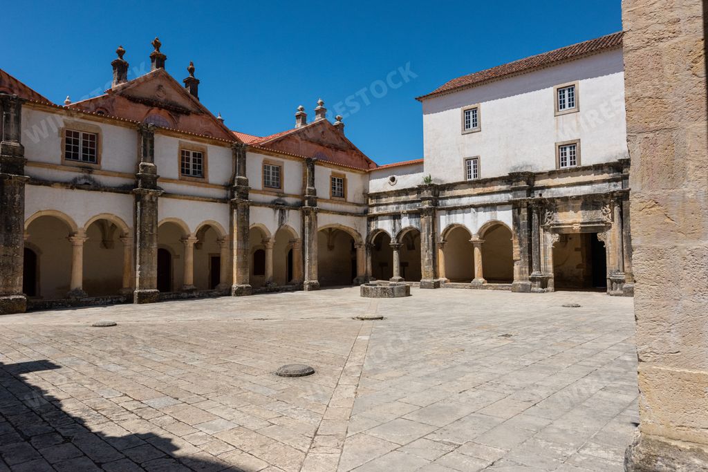 The Templar Castle under sunlight and a blue sky during daytime in Tomar in Portugal