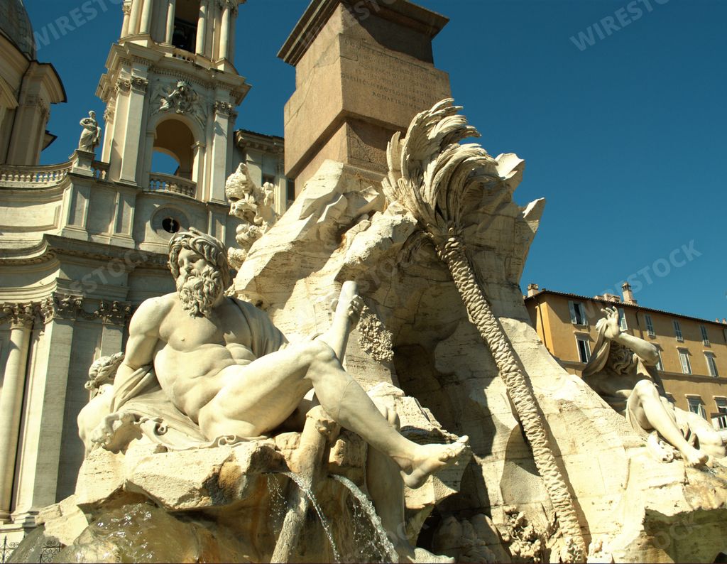 Fountain of the Four Rivers and Sant Agnese in Agone church,  Piazza Navona, Rome, Italy. September 28, 2016.