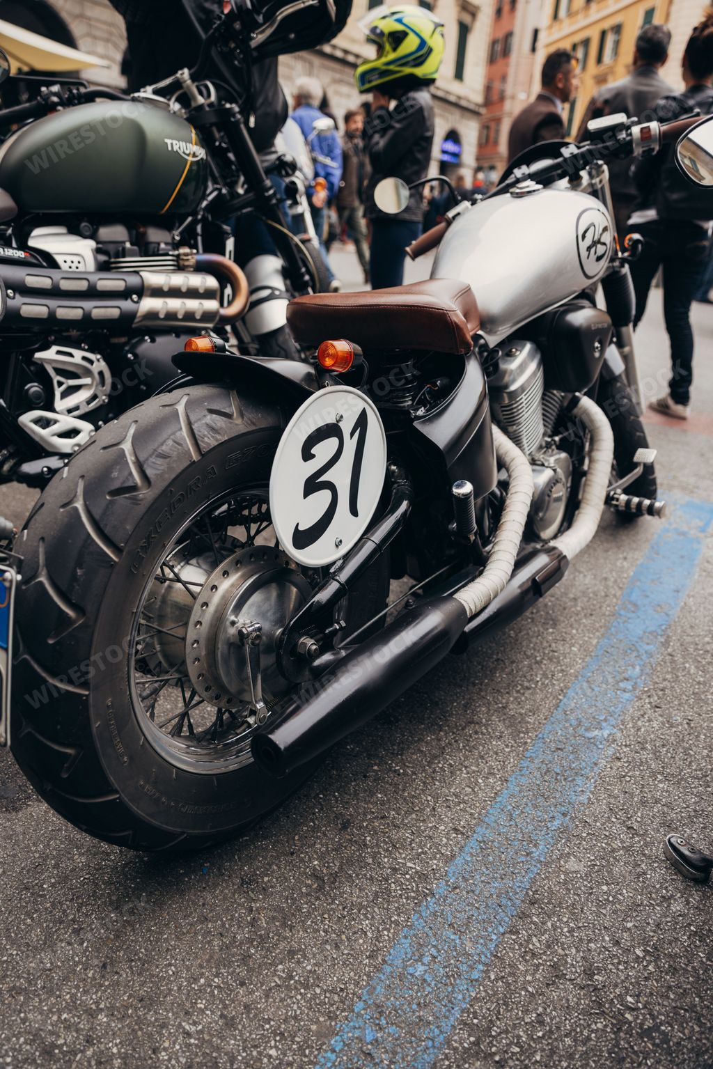 A vertical shot of a motorcycle at Distinguished Gentleman's Ride, a world-famous fundraising event to fight prostate cancer, Genova, Italy