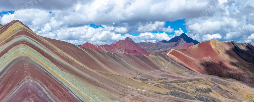 A landscape shot of the beautiful and colorful Rainbow Mountains in Peru. Perfect for a background.