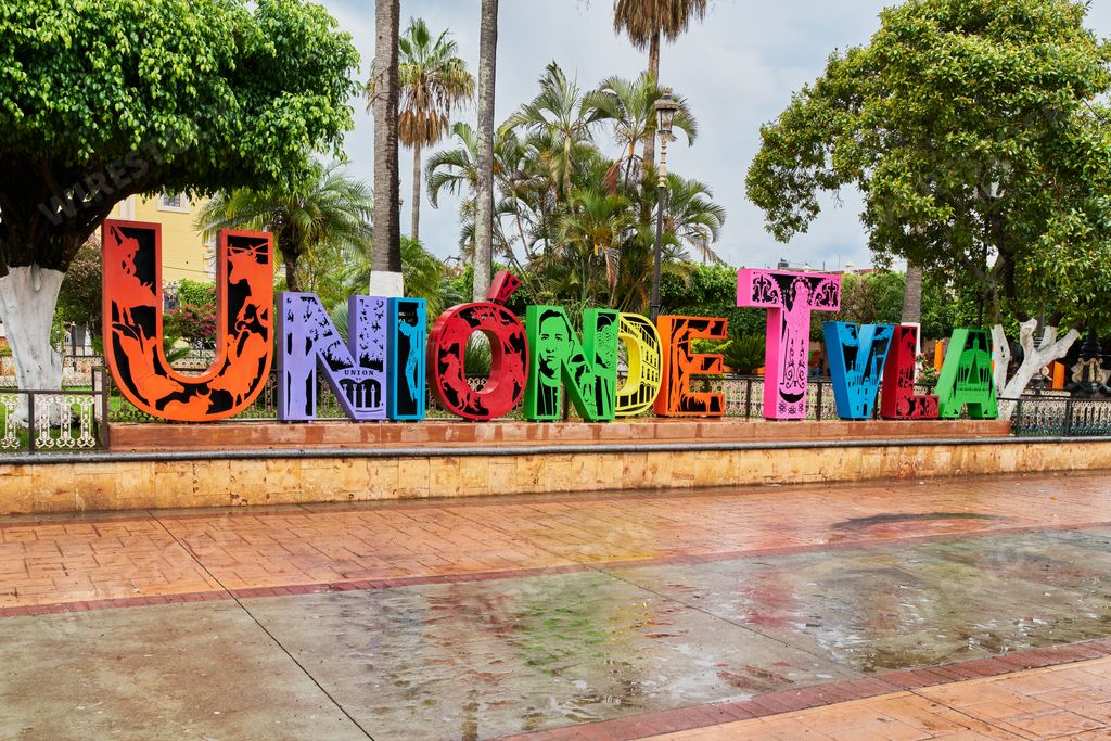 Colorful lettering in the main garden plaza of Union de Tula, Jalisco, with a kiosk in the center