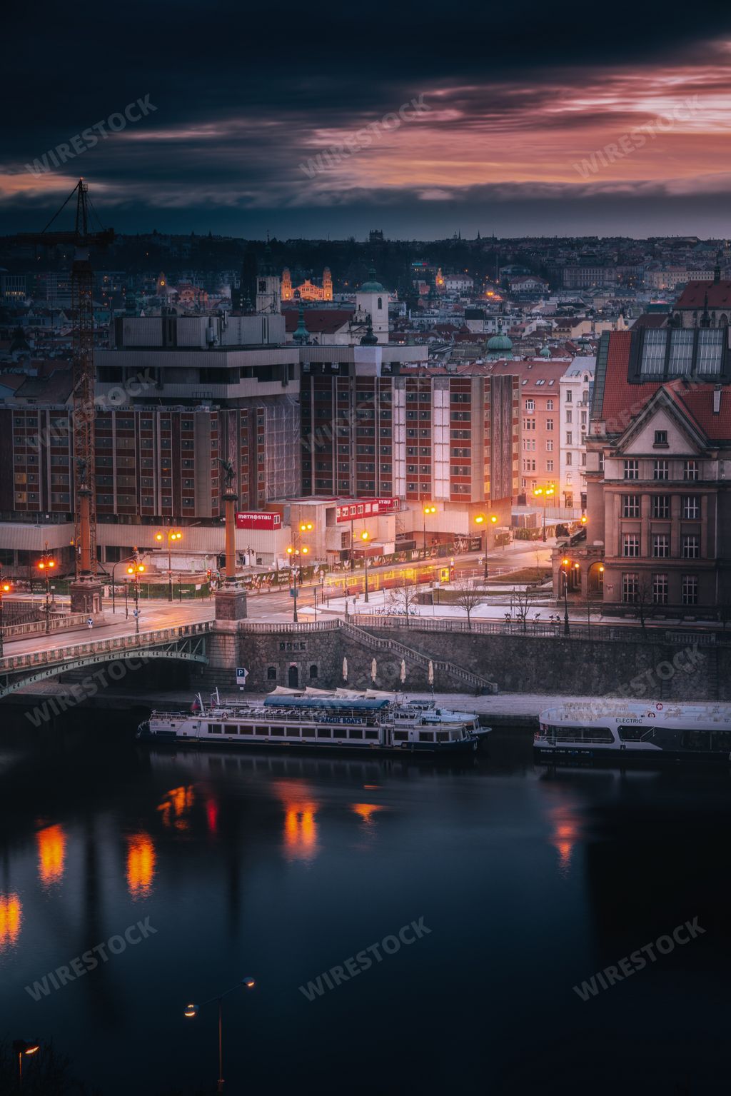 A vertical shot of an evening sky over Vlatava River in Prague