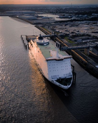 Aerial view of Hull harbor, United Kingdom. The Ship's hull reflects ...