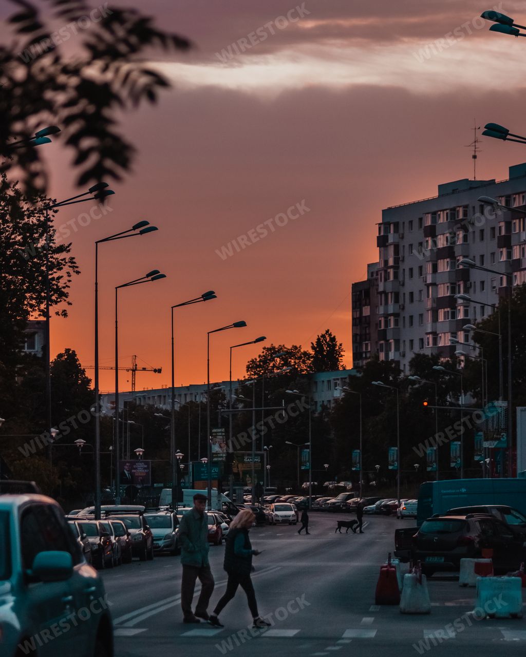 A breathtaking view of the Sunset colors in the sky in the streets of Bucharest Romania