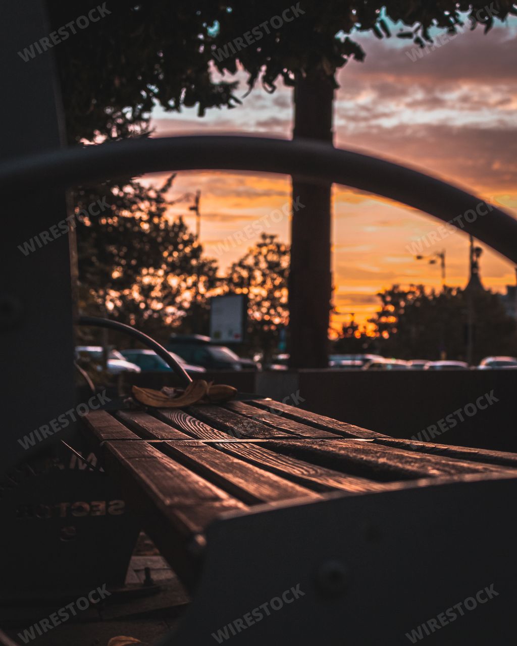 Beautiful sunset sky seen from a wooden bench