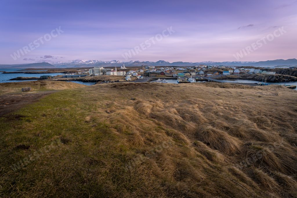The skyline of Stykkisholmur with distant mountains in the background, Iceland