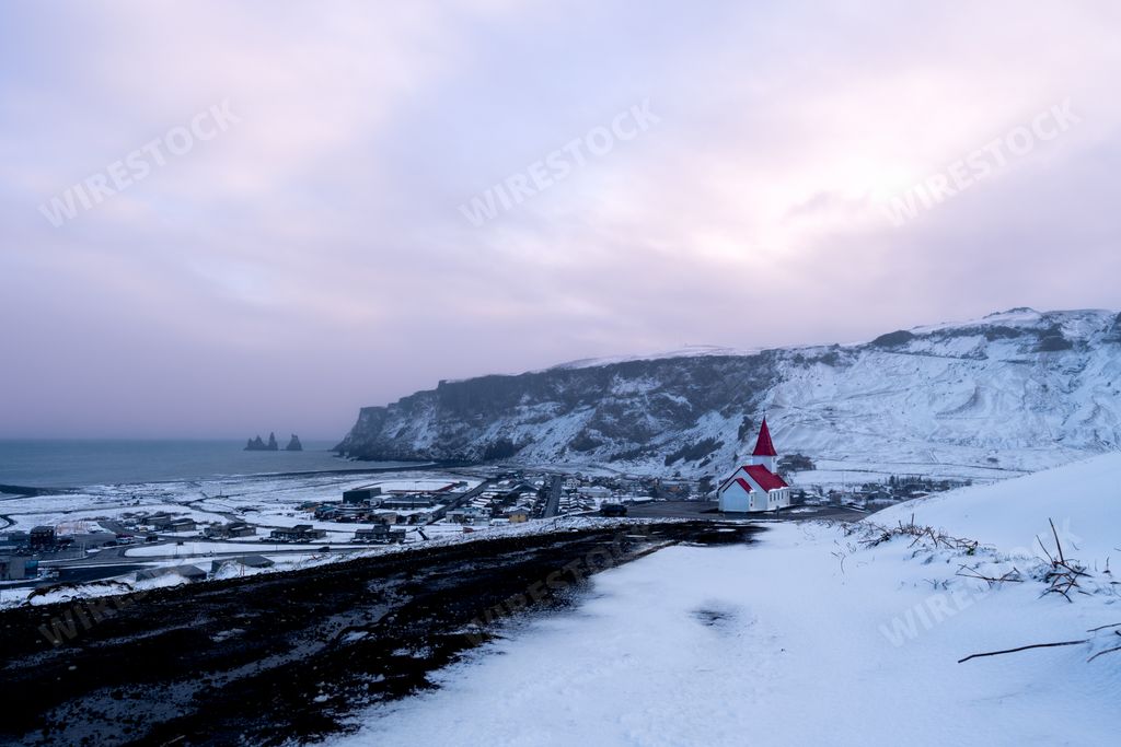 The Church and town of Vik on a cloudy day, Iceland