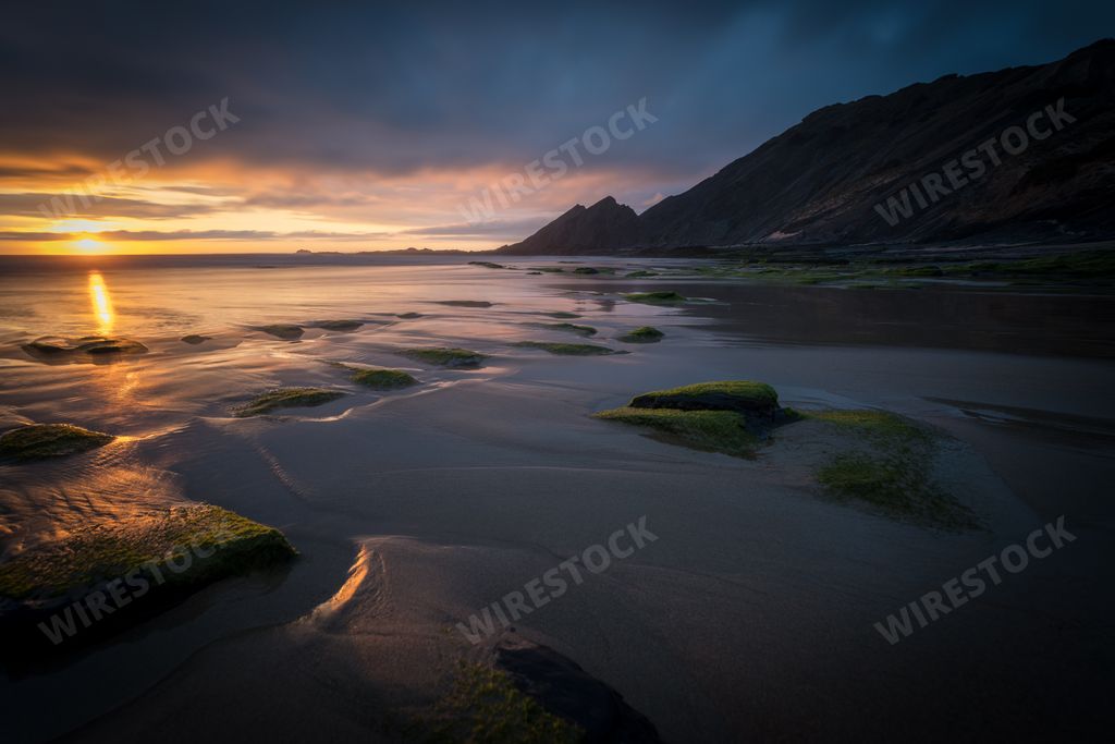 A beautiful shot of seashore scenery on colorful sunset