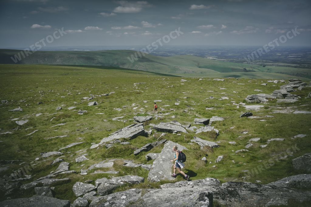 Group of walkers hiking on Dartmoor.