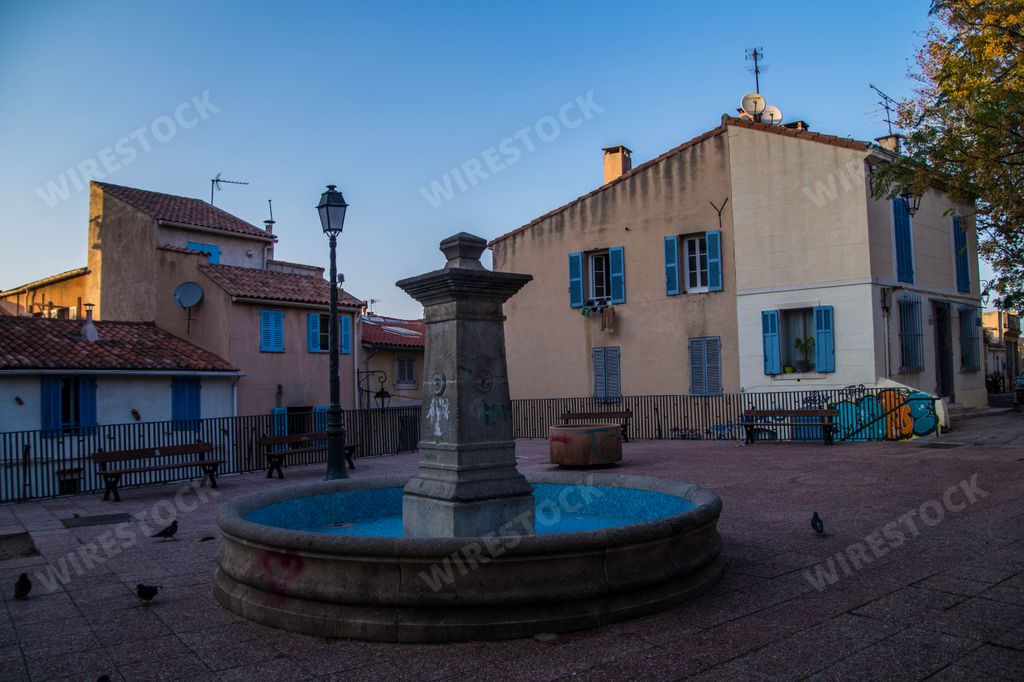 The fountain and benches in the park. Bouches-du-Rhone, Marseille, France