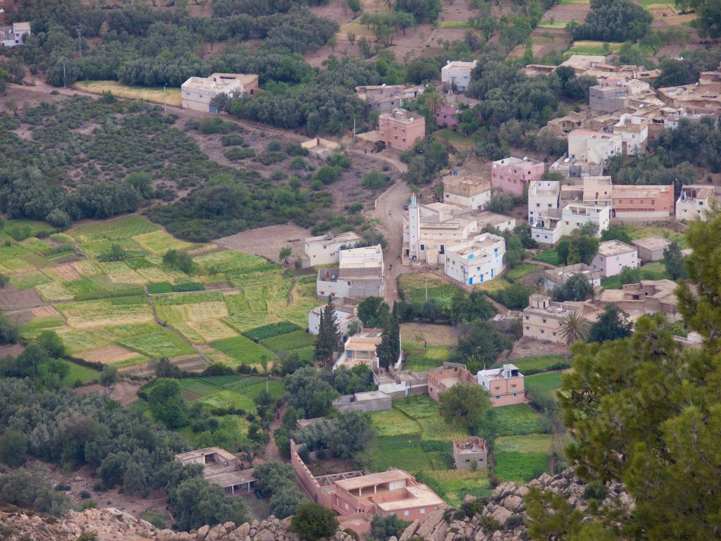 A bird's eye view of the rural village and mountains on a sunny day in Imouzzer Ida Ou Tanane, Agadir, Morocco