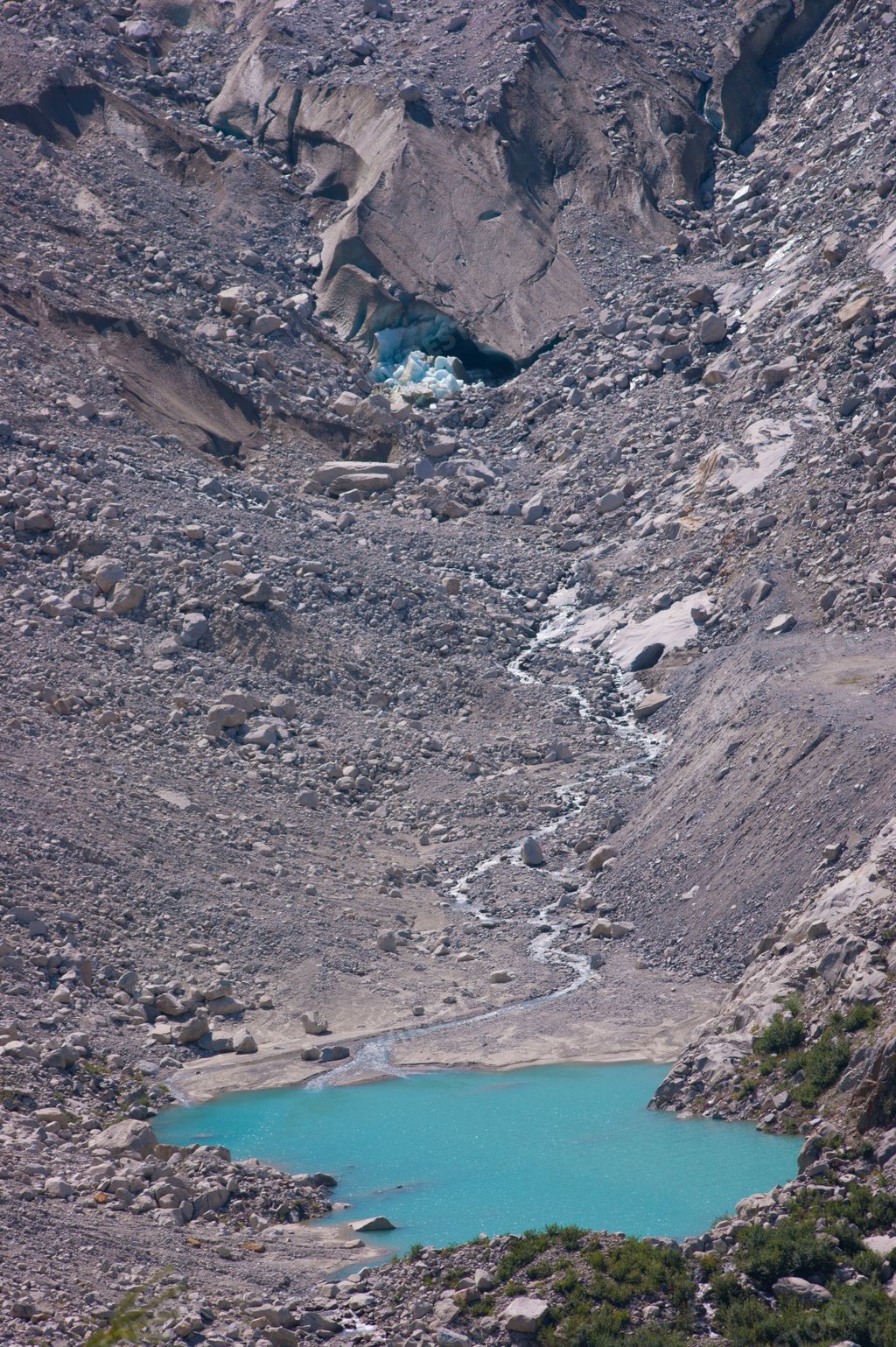 A photo of a pond in a mountain, Chamonix-Mont-Blanc, France