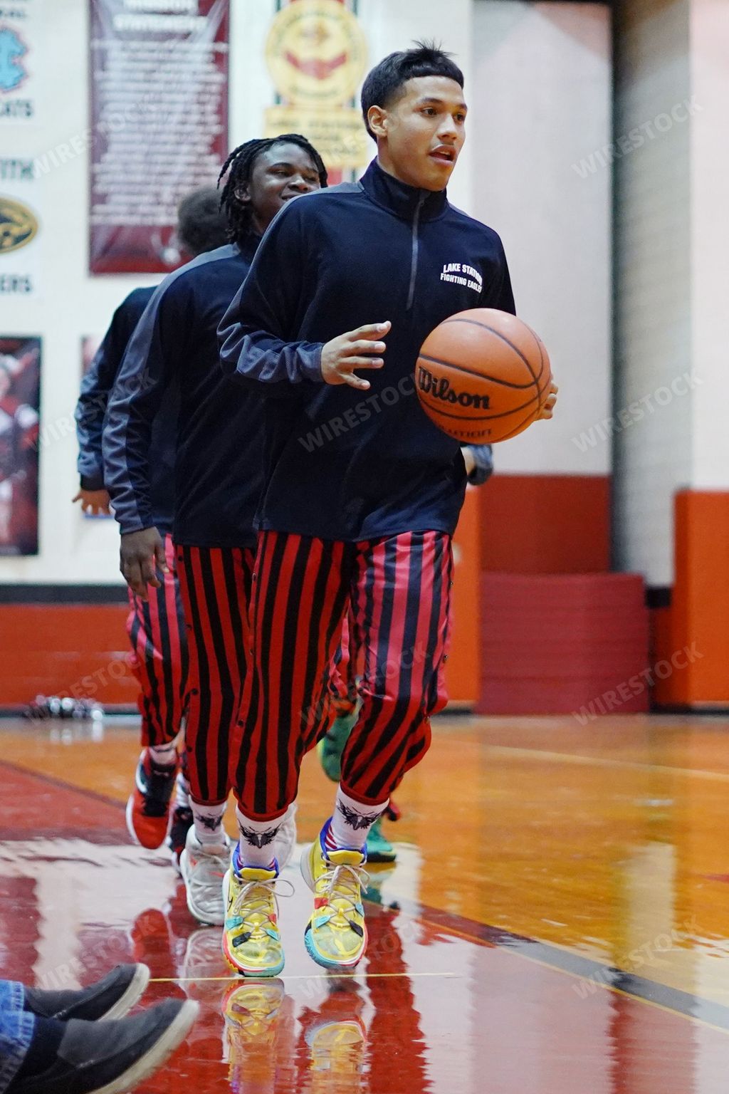 The male players practicing before Lake Station vs Hebron Indiana high school basketball game