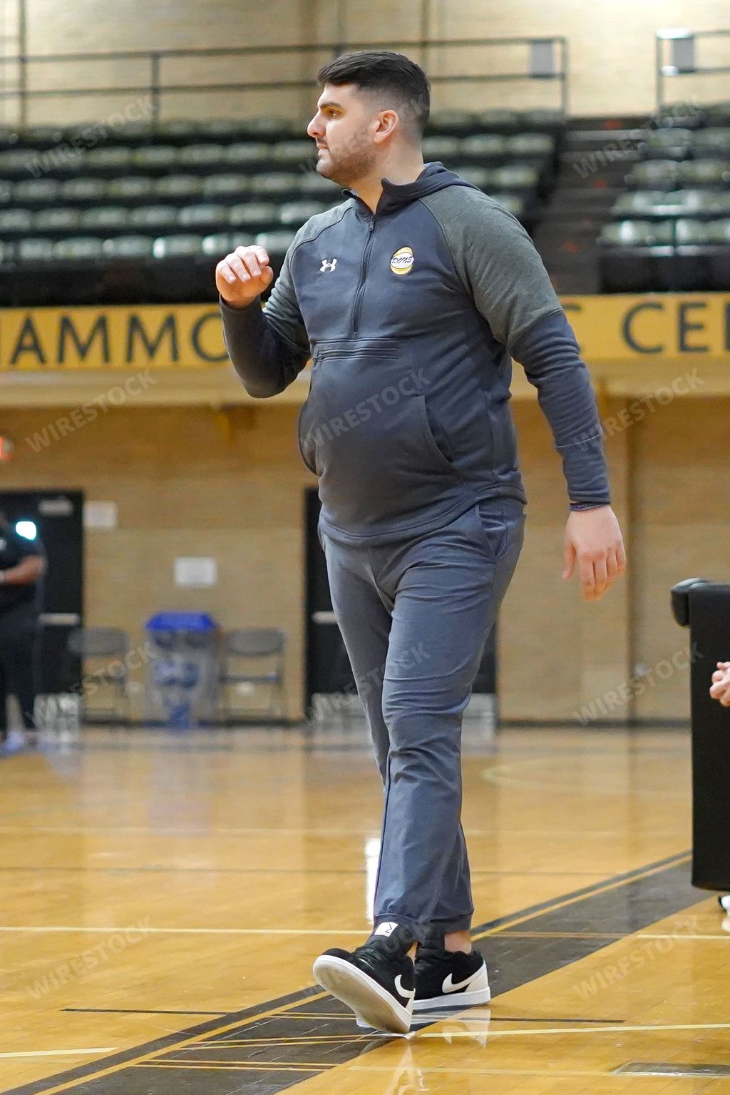 A vertical of a Caucasian coach of basketball at Bosco vs United Prep game in Hammond, Indiana