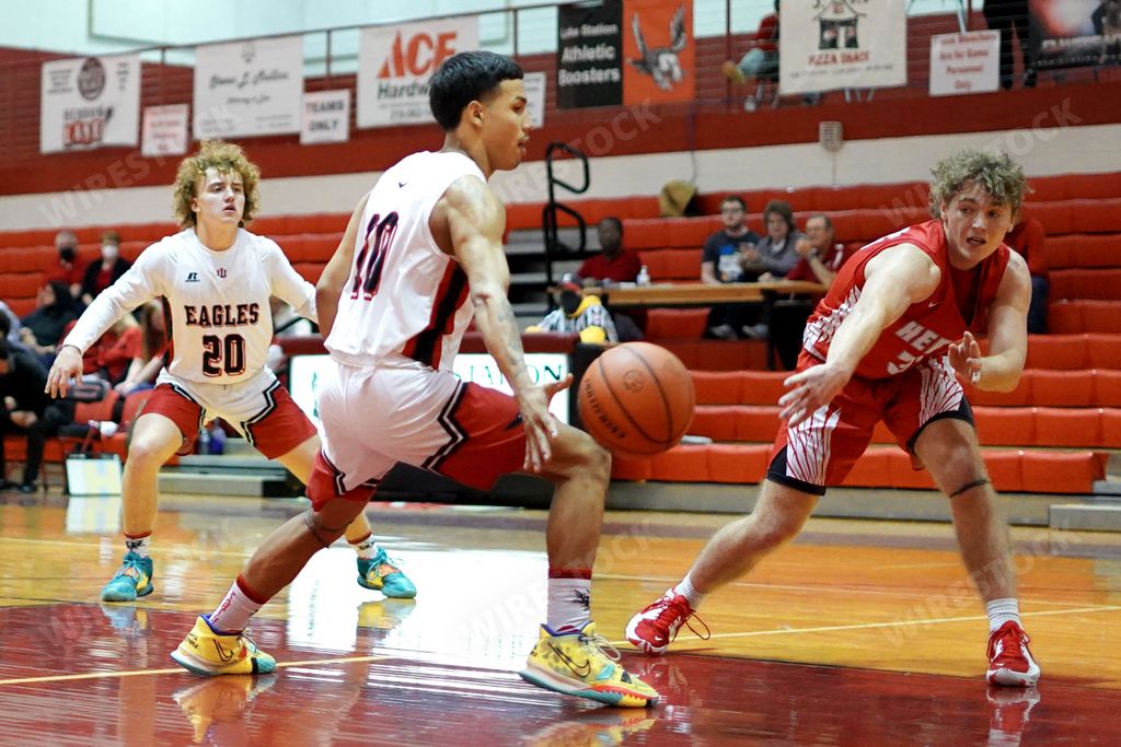 The indoor high school basketball game of Lake Station vs Hebron playing a tournament