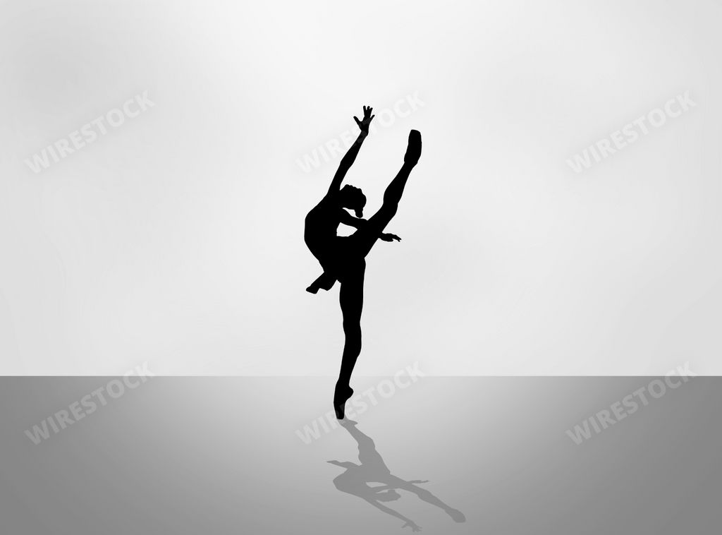 A silhouette of a beautiful dancing ballerina
