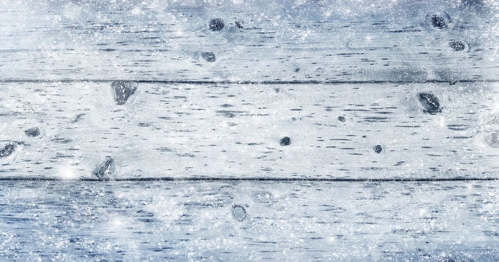 A closeup of a grey laminate flooring texture background