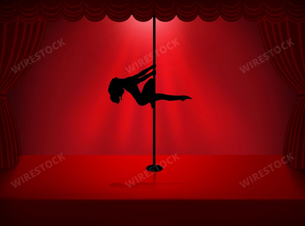 A silhouette of pole dancer on red background