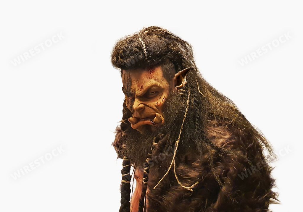 A fictional ork with angry face isolated on white background