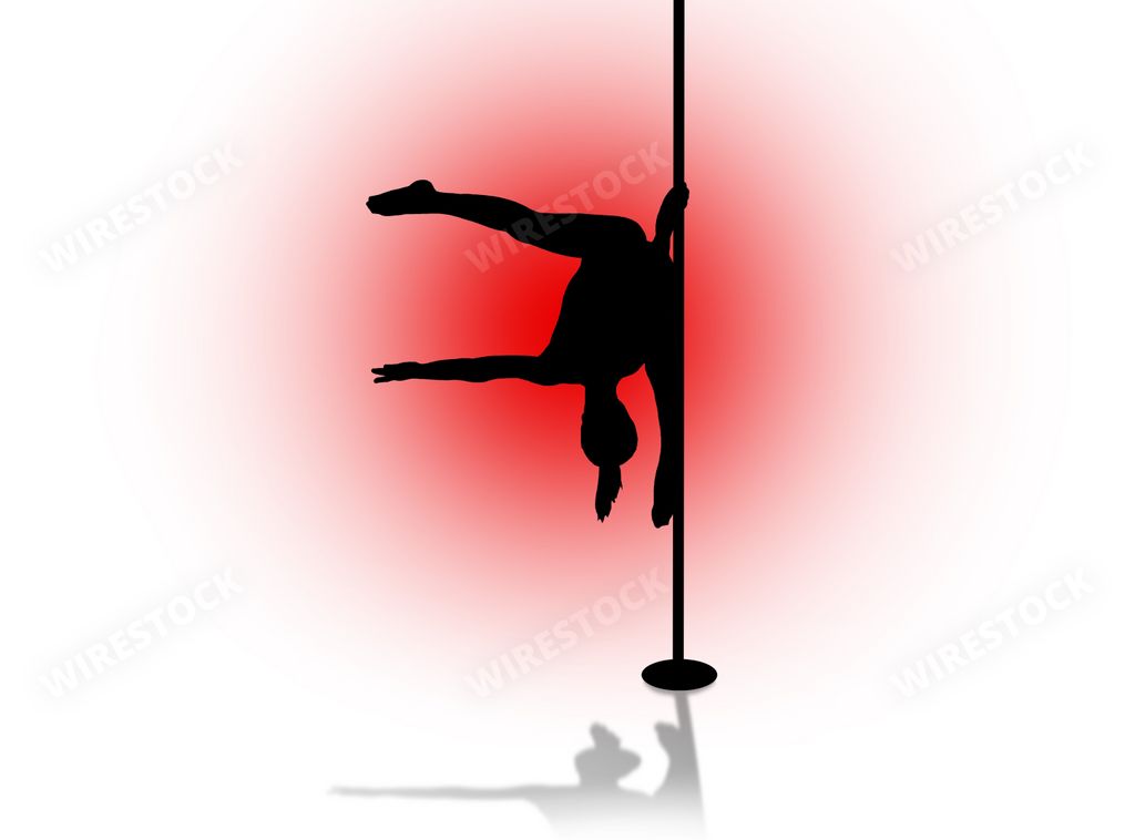 A silhouette of a stripper dancer on a pole on a red background
