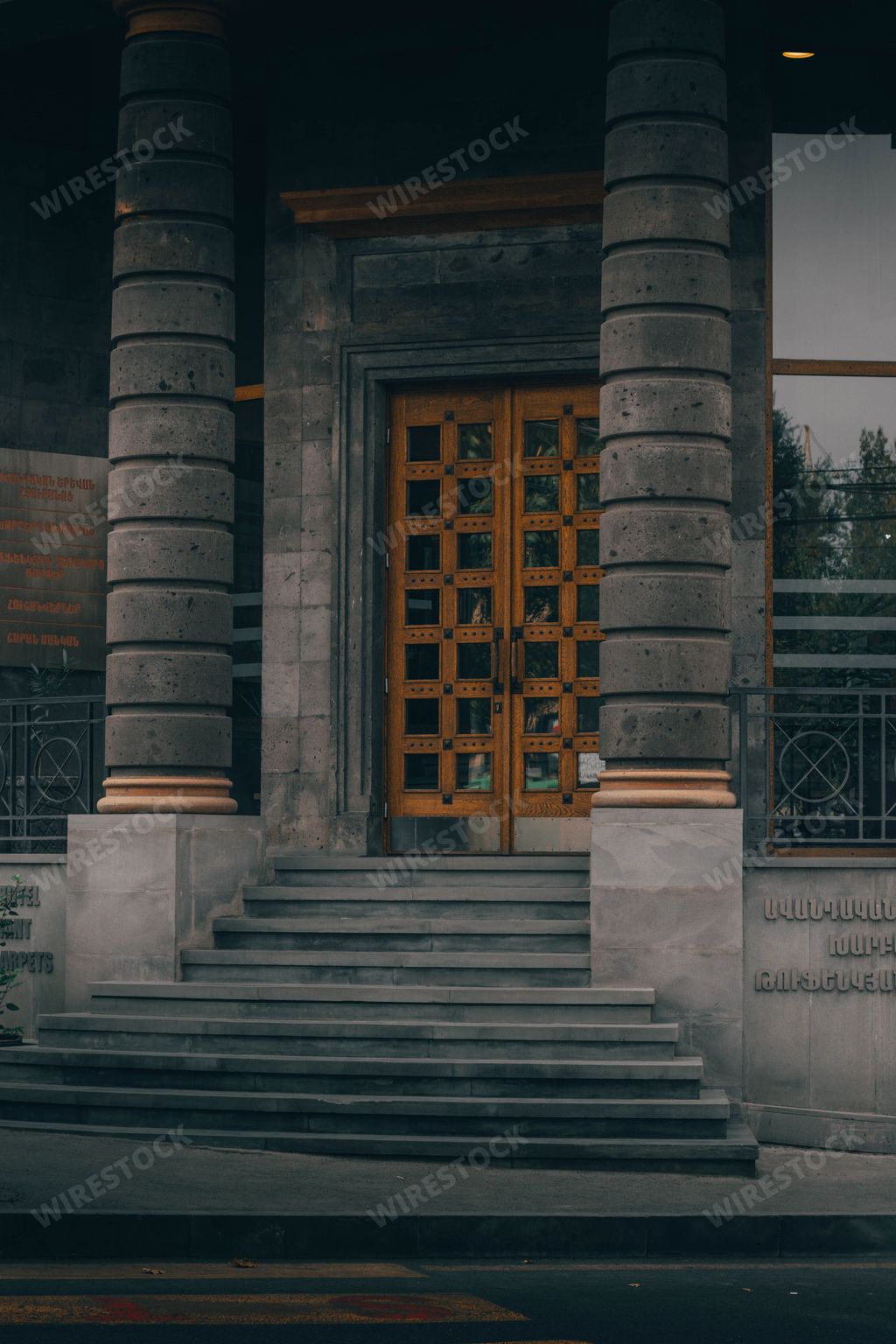 The entrance of an old, historical building made of black stone, Yerevan, Armenia