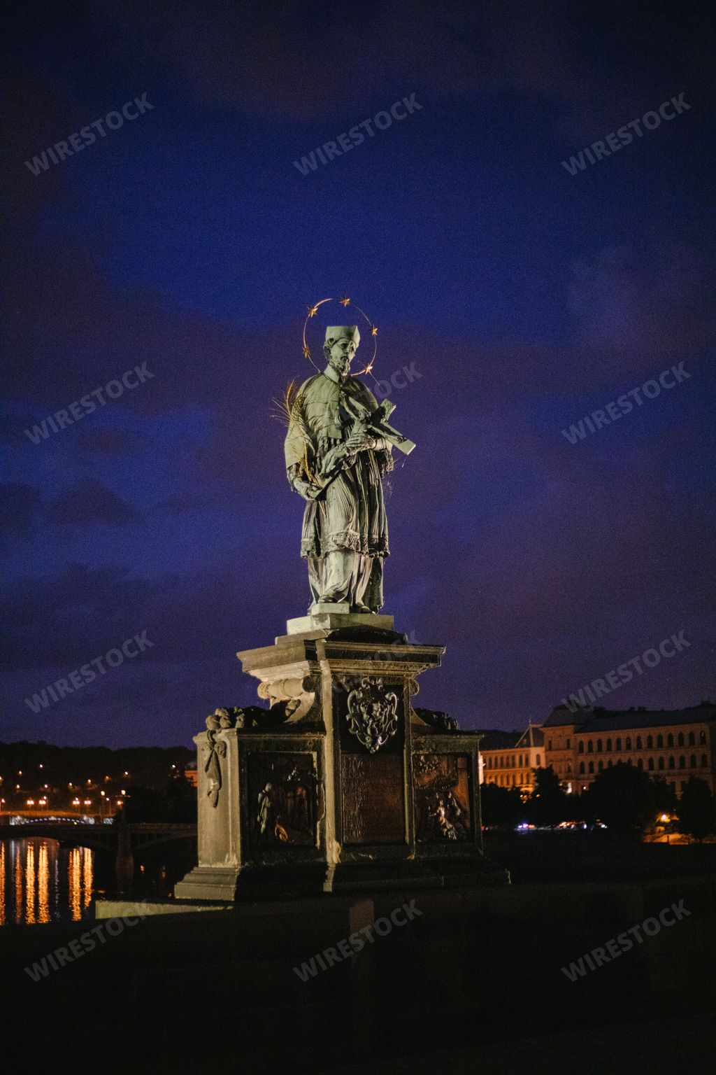 A vertical shot of Charles Bridge John of Nepomuk statue in Prague