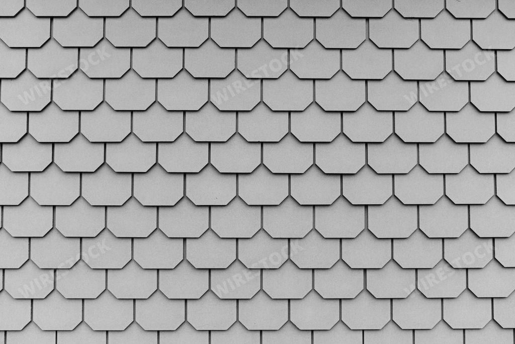 A fragment of gray octagon-shaped roof tiles