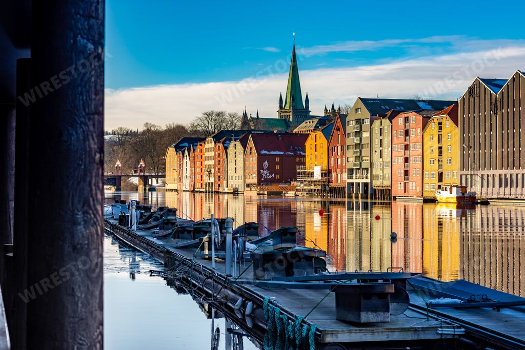 A beautiful view of the colorful houses near the Nidelva river in Trondheim Norway