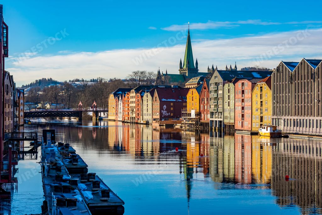 A beautiful view of the colorful houses near the Nidelva river in Trondheim Norway