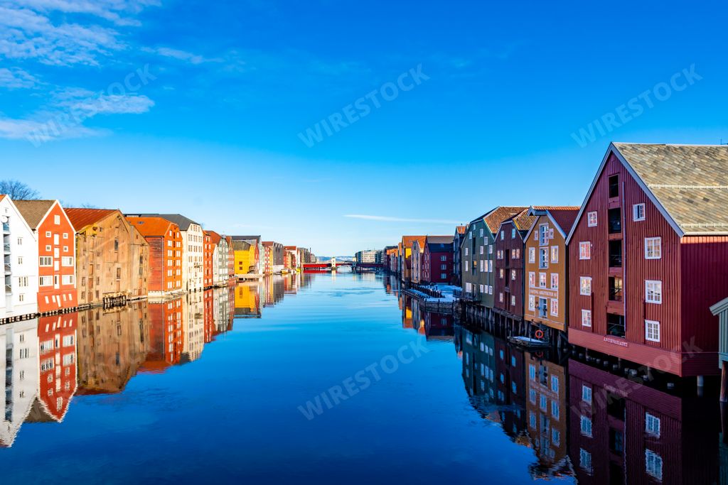 A beautiful view of the colorful houses near the Nidelva river in Trondheim Norway