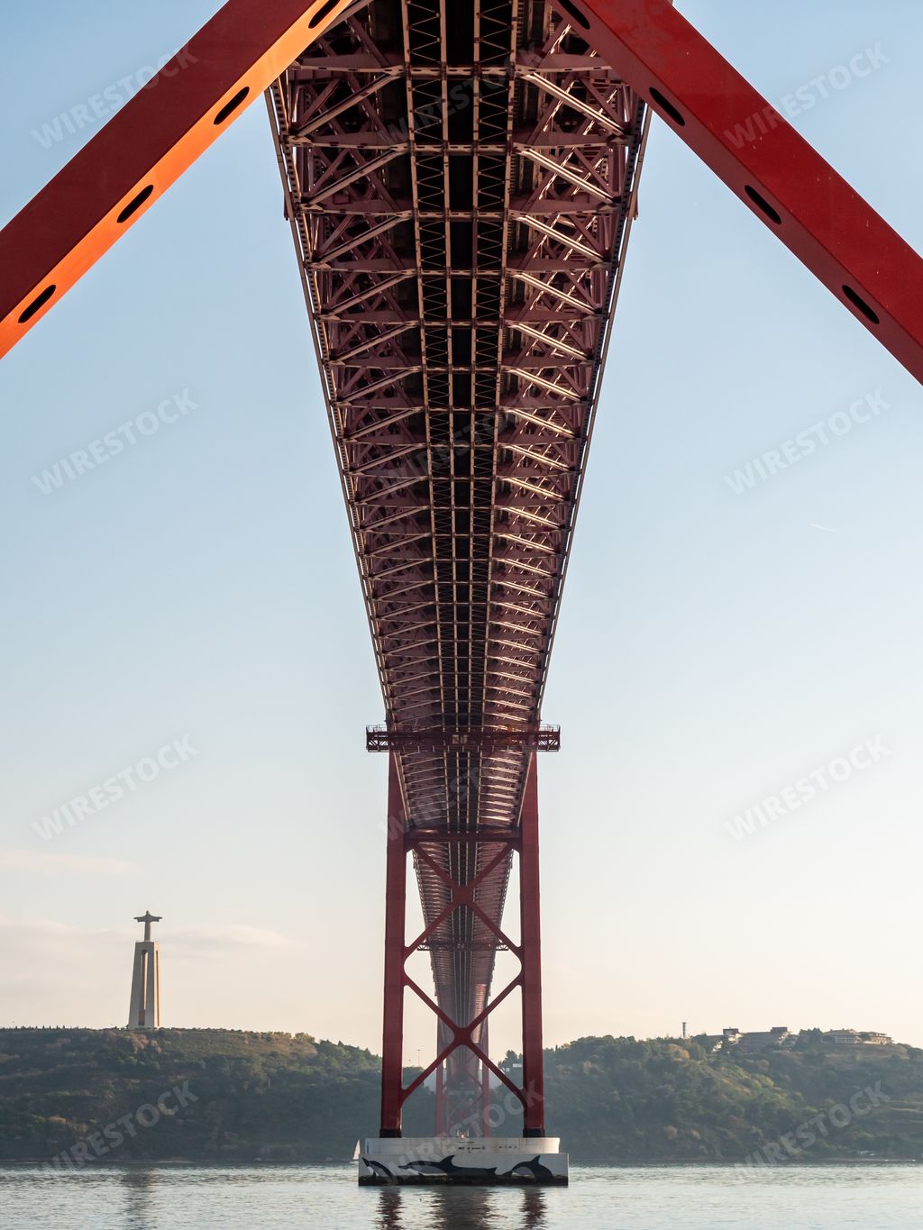 A vertical shot of the 25 de Abril Bridge in Lisbon, Portugal