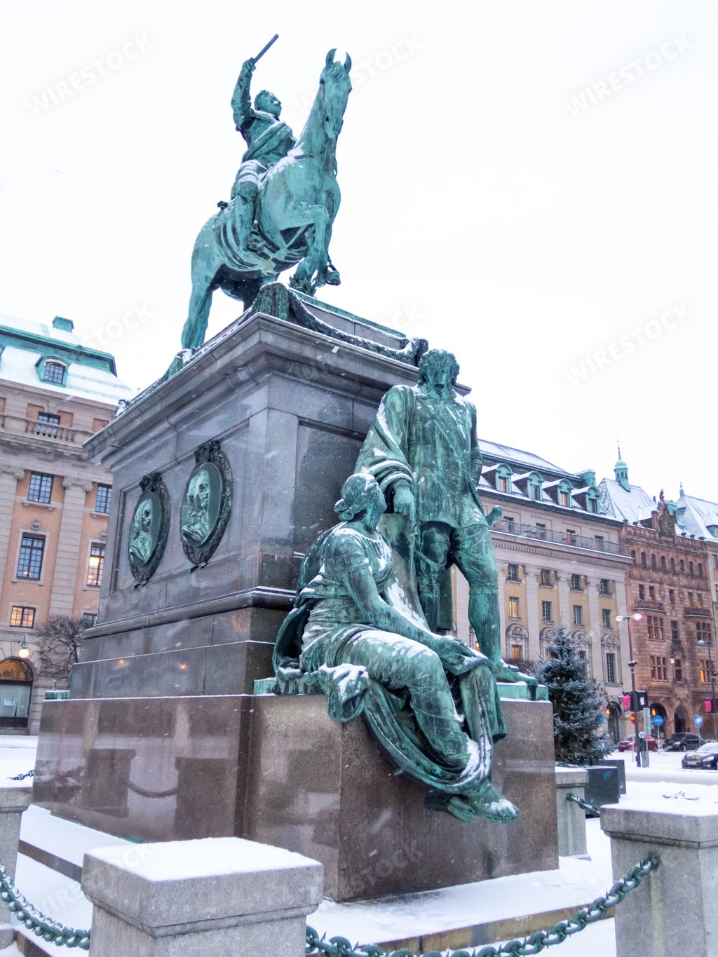 A vertical shot of a statue of Gustav II Adolf located in front of the Royal Swedish Opera House in Stockholm, Sweden