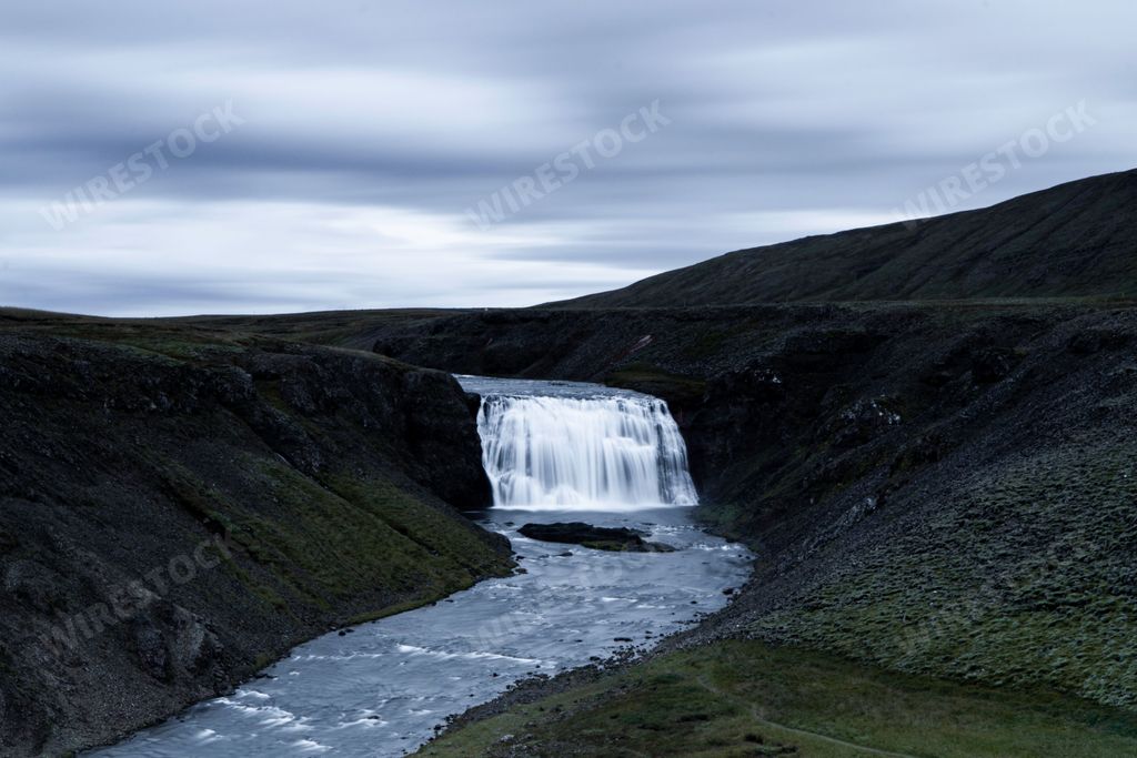 The Thorufoss waterfall in Iceland flowing down the rocks during the daytime