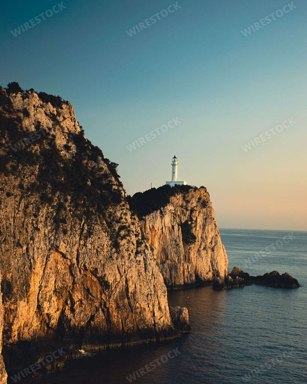 A vertical shot of the lighthouse on the Lefkada Island, Greece