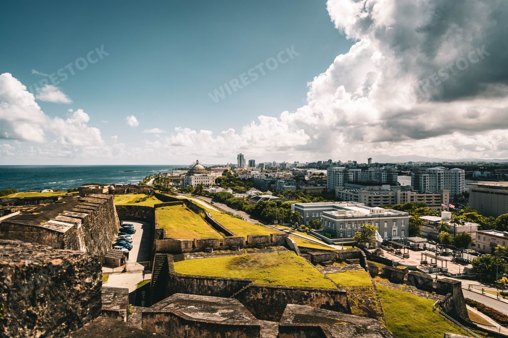 A drone view of the Castle of San Cristobal with cloudy sky in background, San Juan, Puerto Rico
