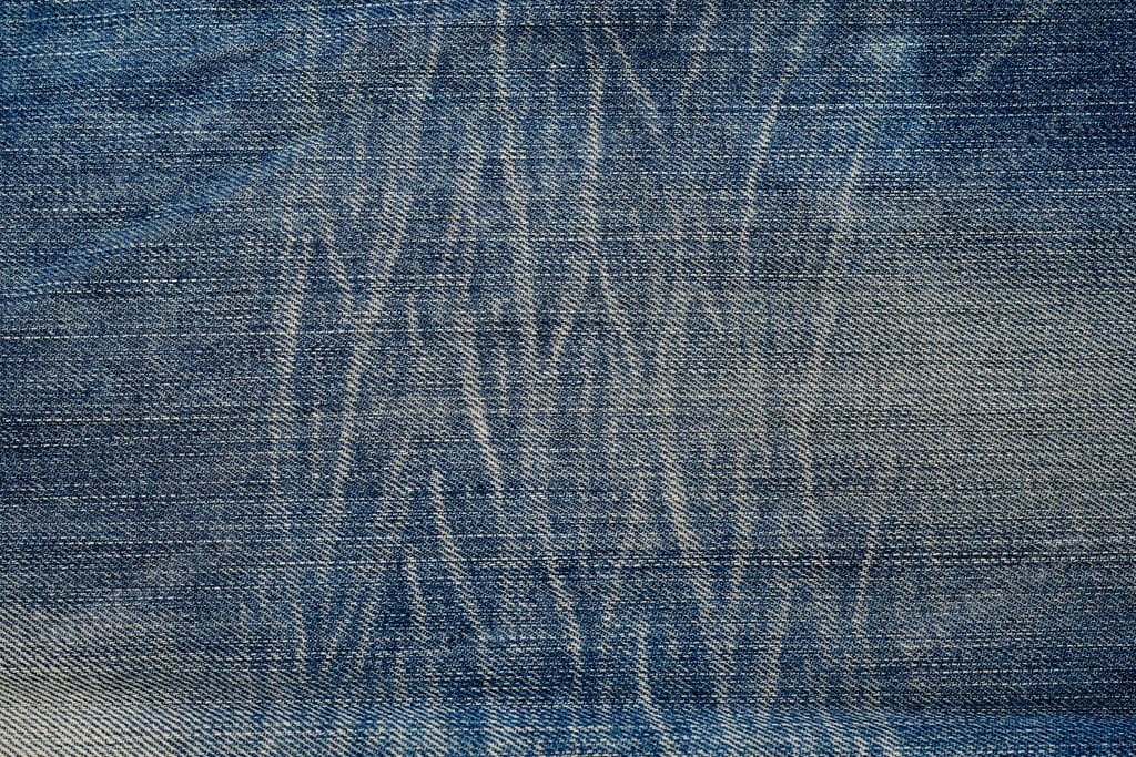 The worn out patterned texture of jeans