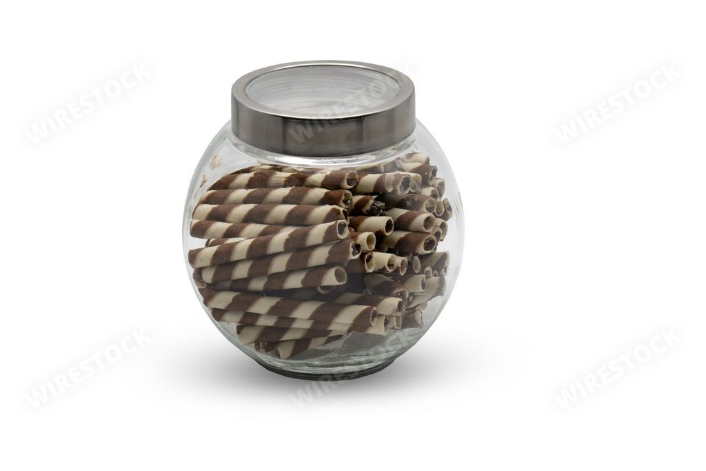 A chocolate-flavored wafer sticks on a canister isolated on white background