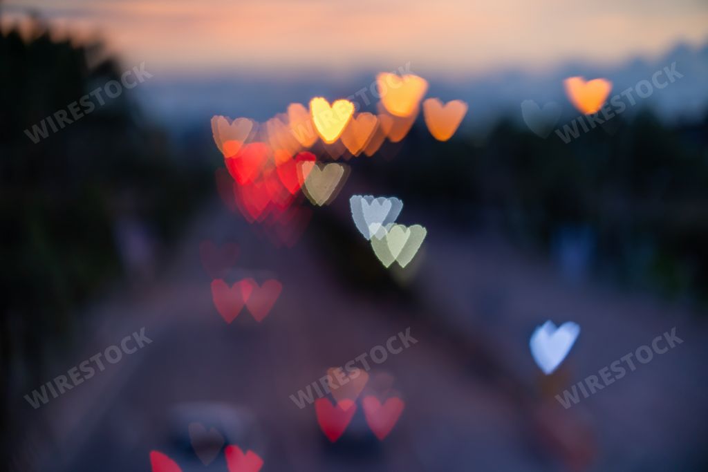 A beautiful heart-shaped bokeh lights with a blurred background