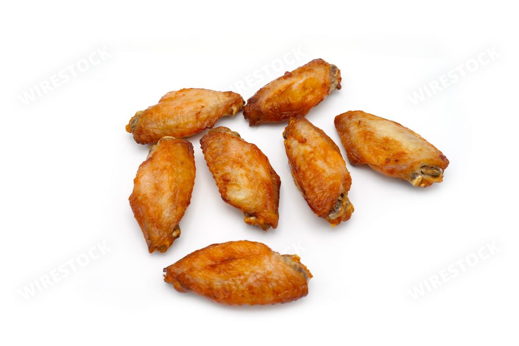 A closeup shot of a fried chicken wings isolated on white background
