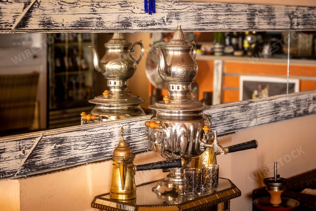 Many moroccan tableware tagines in a room