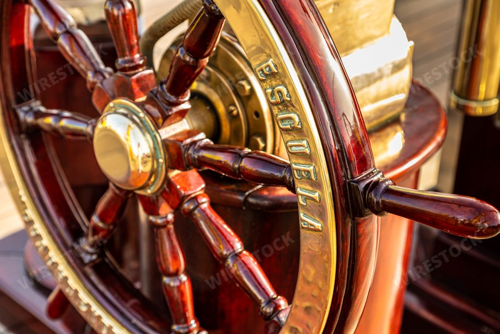 A closeup shot of the wooden steering wheel
