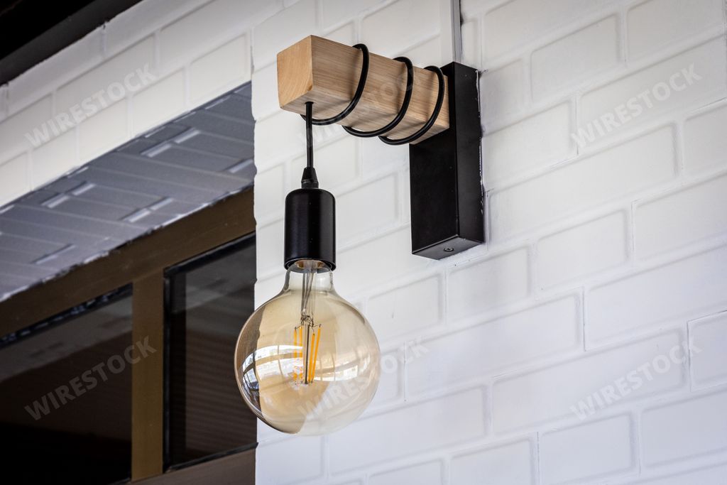 A close-up shot of hanging vintage light bulb